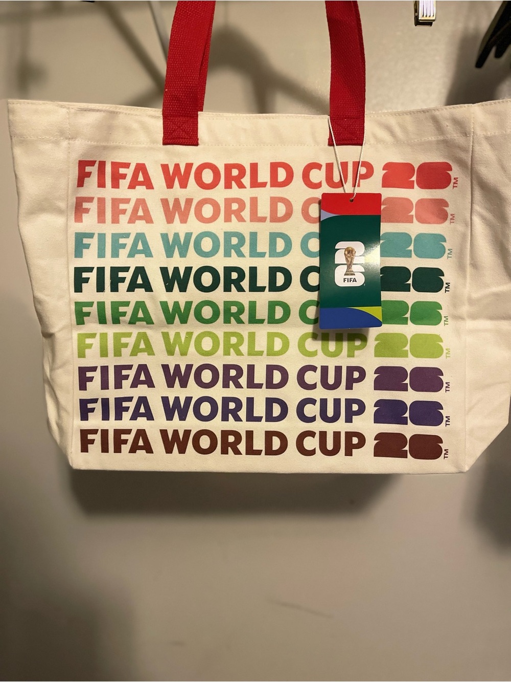 FIFA Canvas Tote Bag in Cream with Multicolor Print and Red Handles